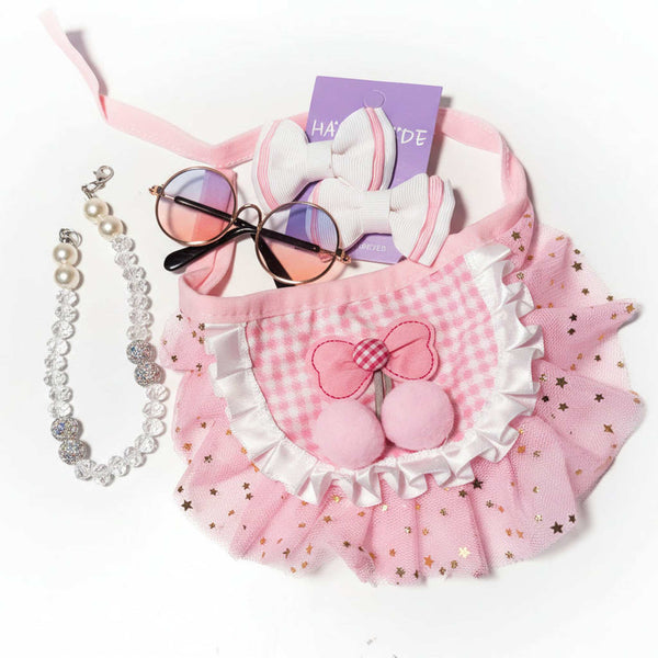 pink princess dog outfit with tutu, pearl collar, sunglasses and bows
