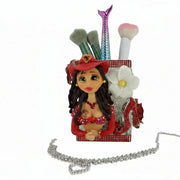 porcelain doll brush holder with cowgirl outfit and glitter charms for vanity