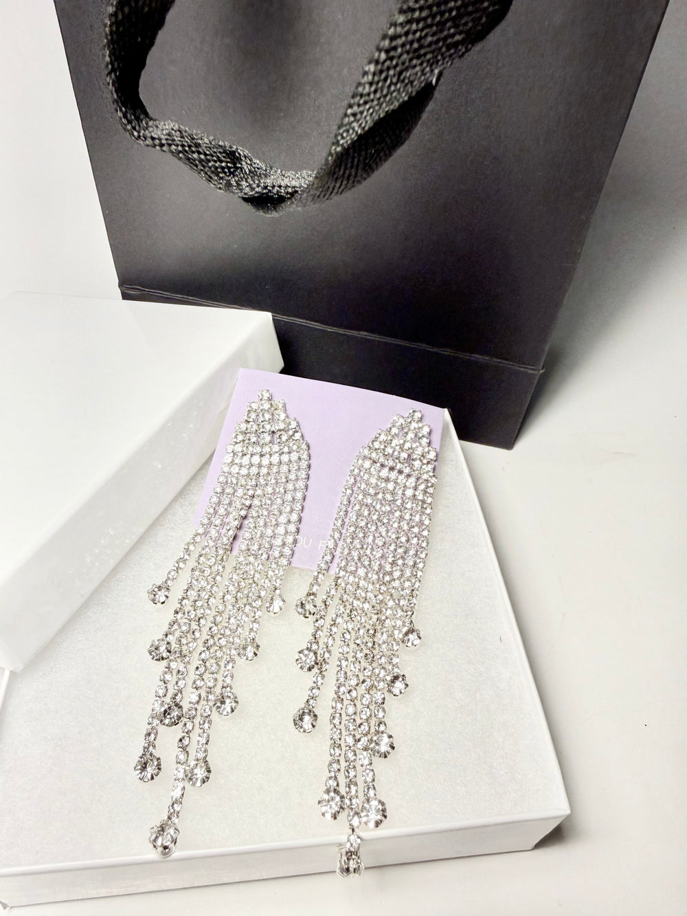 Silver-tone rhinestone chandelier earrings with cascading fringe tassels for weddings and special occasions
