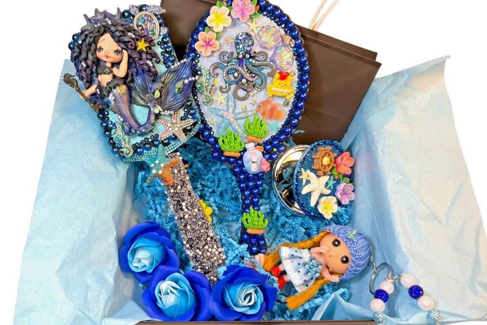 Mermaid Decoden vanity set featuring a decorated hair brush with a cold porcelain mermaid princess, a sea-themed handheld mirror with a metal octopus, and a matching ocean-style compact mirror.