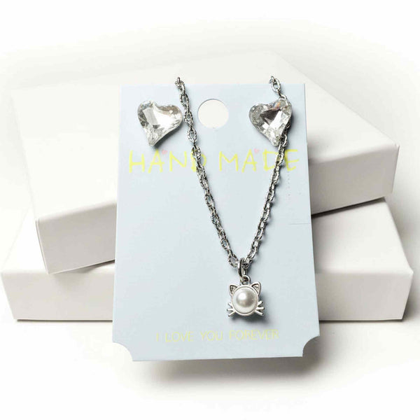 silver-tone cat pendant necklace with white faux pearl and heart crystal earrings 