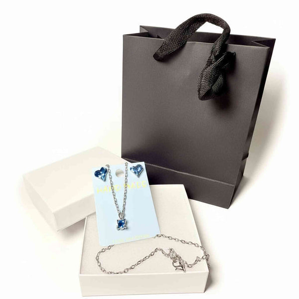 silver tone cat pendant necklace and blue heart crystal earrings 
