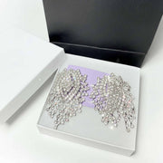  sparkling rhinestone fringe earrings with a brilliant for weddings and formal events