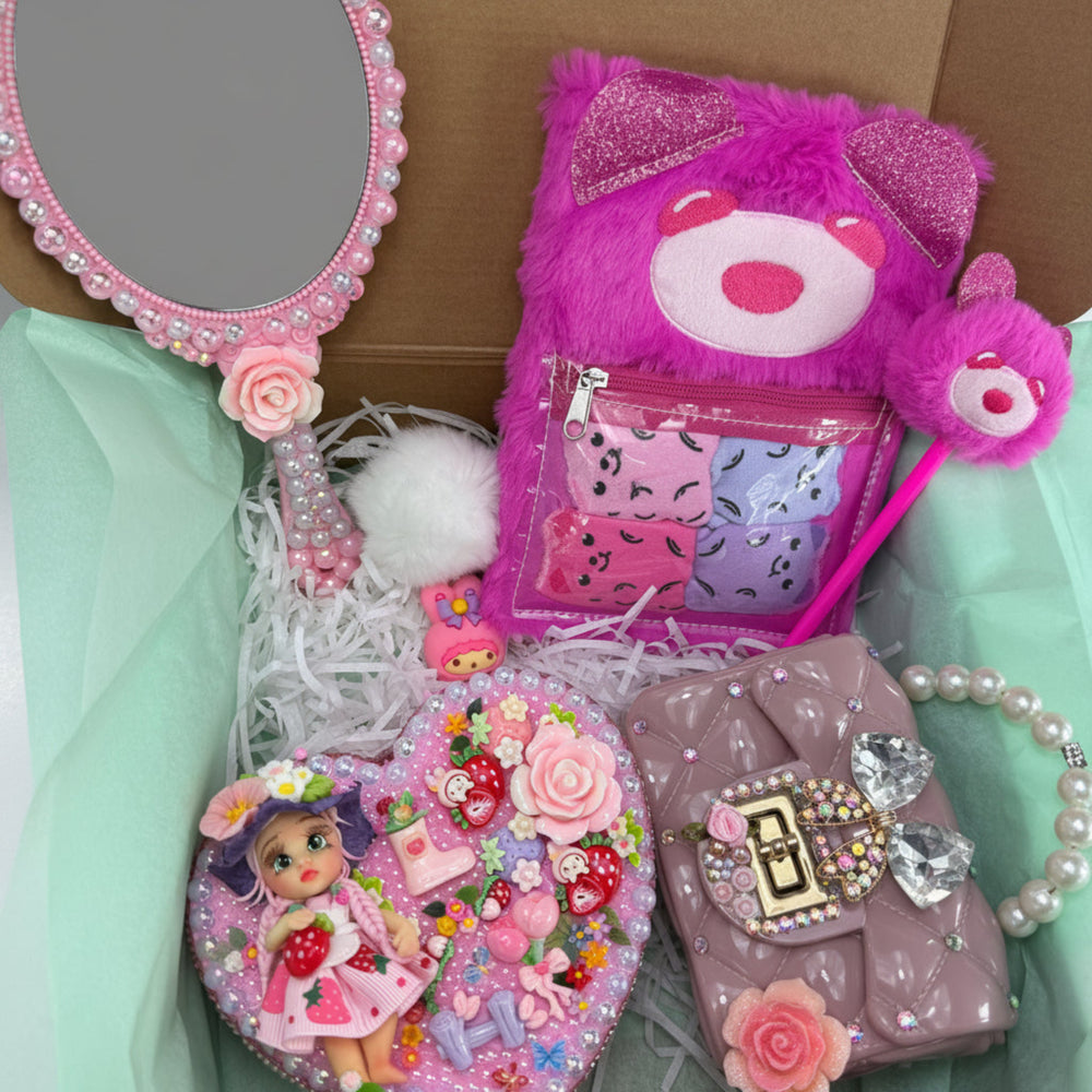 strawberry coquette gift basket with handmade decoden mirror plush pink journal and a beaded handle jelly purse
