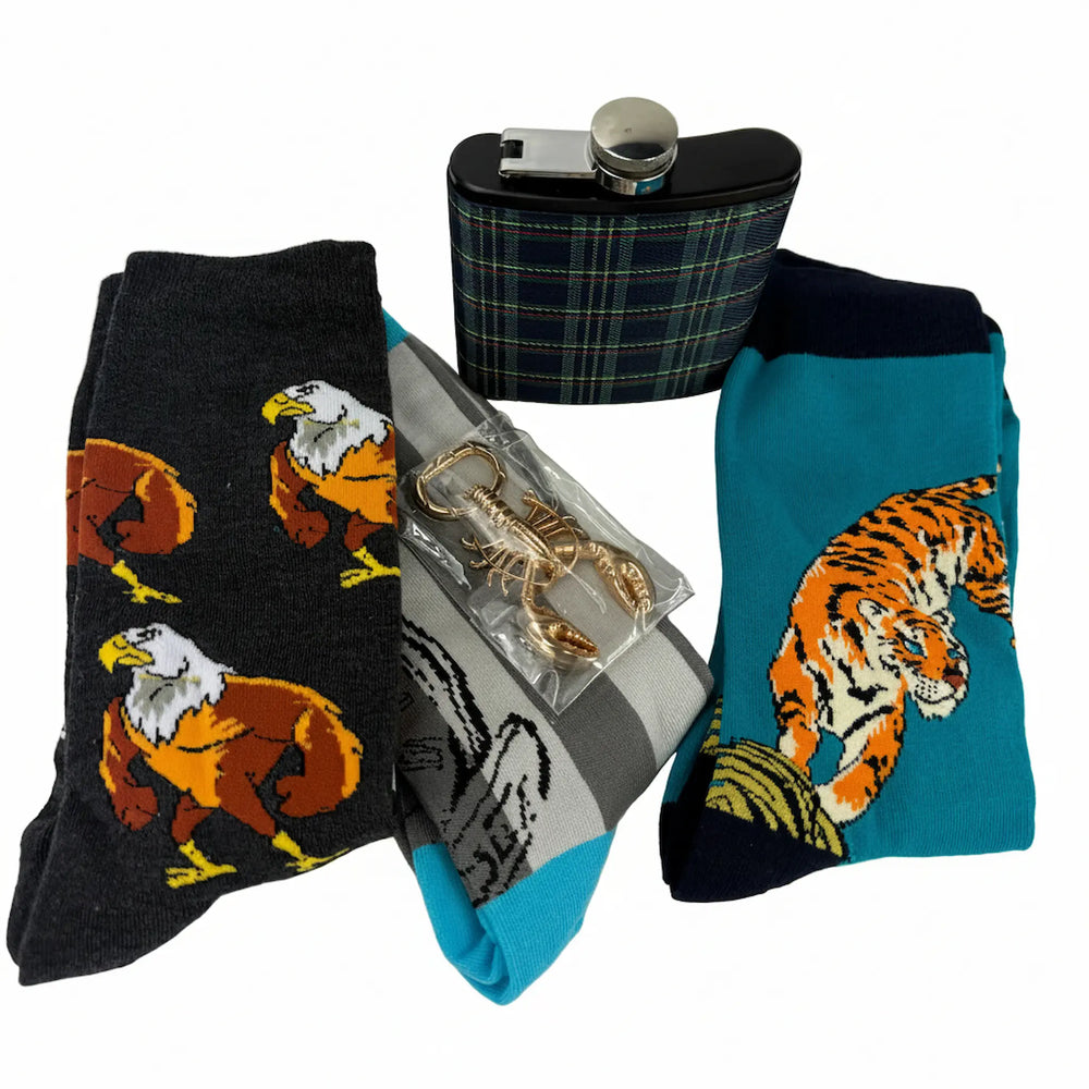 three pairs of novelty men's socks with tiger print, eagle print and blue striped pattern