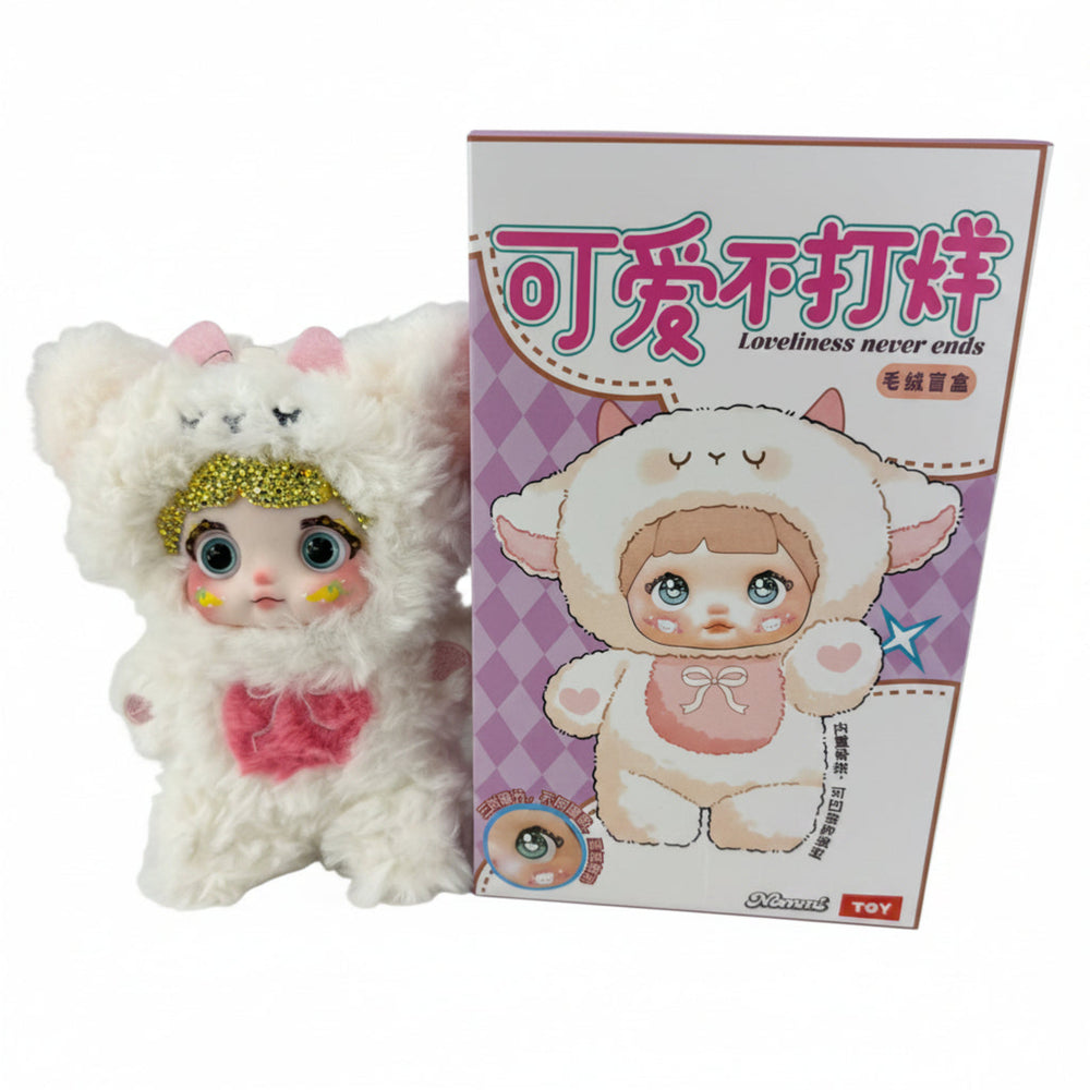 white nommi crystal bedazzled vinyl plush pendant with sparkling crystals and color-changing eyes, kawaii collectible